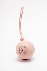 Silverette Happy Nipples pink silicone holder for silver nursing cups, closed, with #HAPPYNIPPLES logo and carry loop